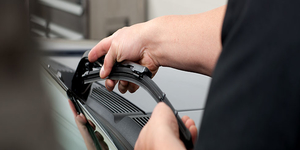 A photo of us installing wiper blades.